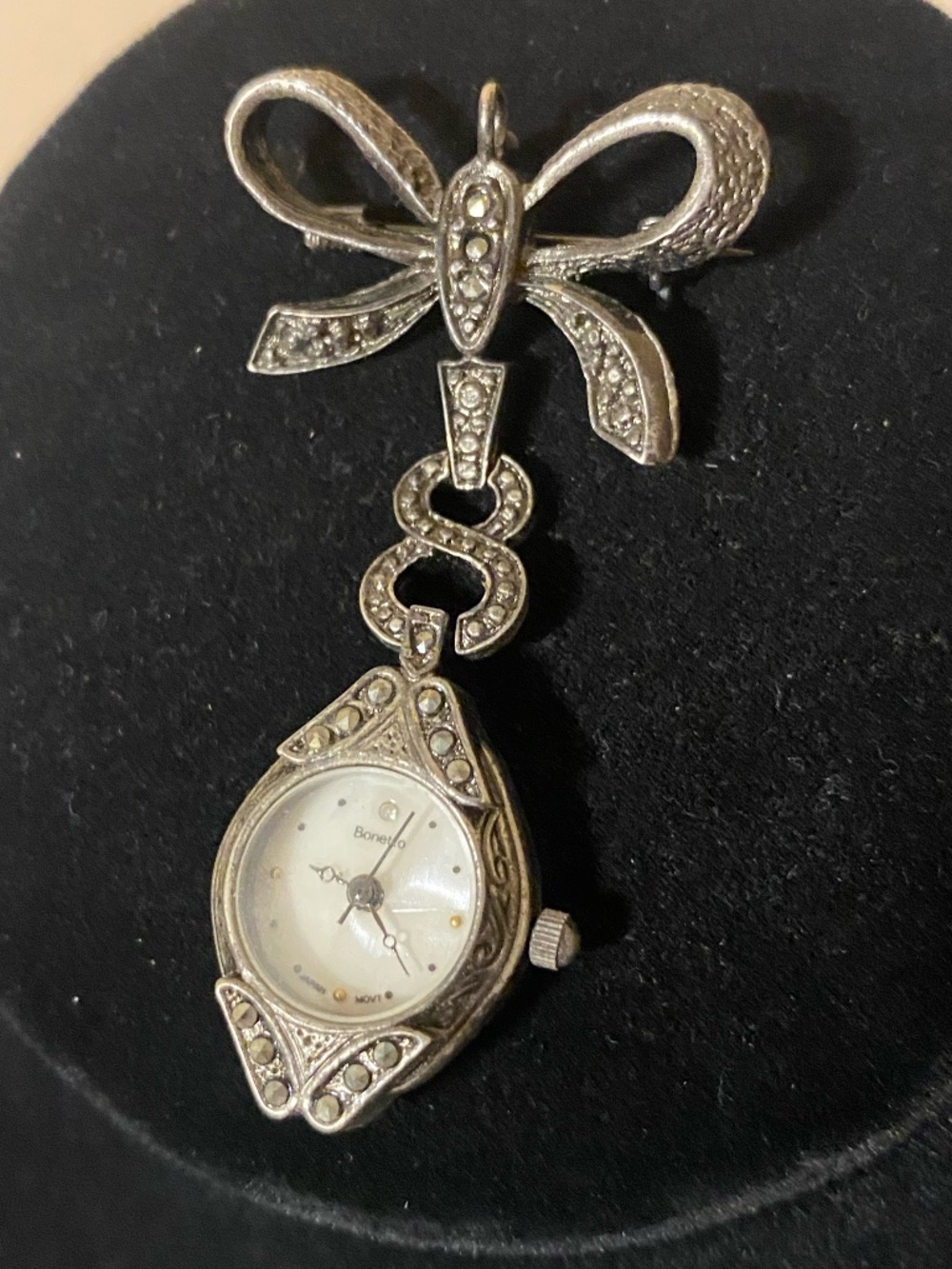 watch brooch